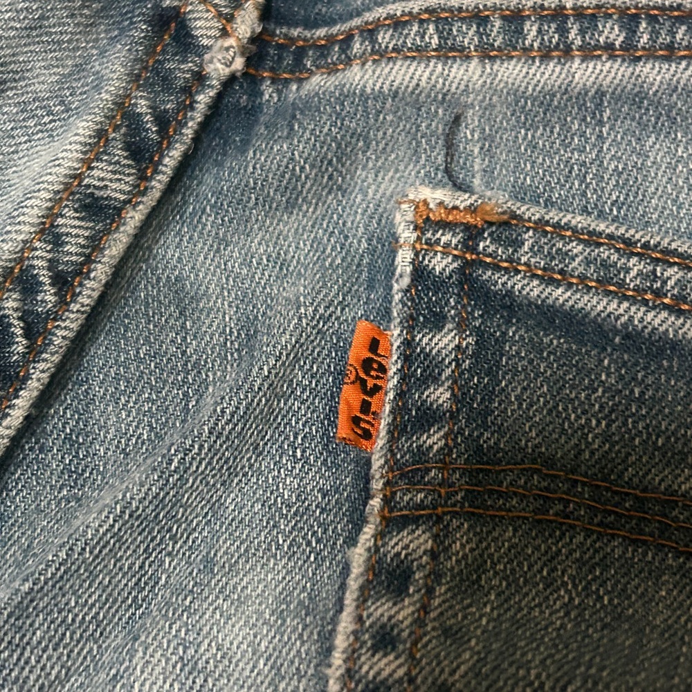 A classic pair of authentic Levi's JORTS (with a cute patched hole in the bum)